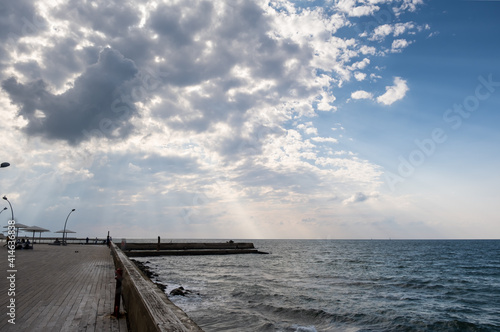 Tel-Aviv port promenade at cold winter sunset