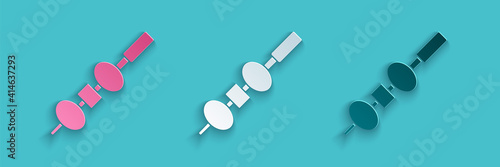 Paper cut Olive and cheese on chopstick icon isolated on blue background. Canape, tapas with cheese and olive. Paper art style. Vector.
