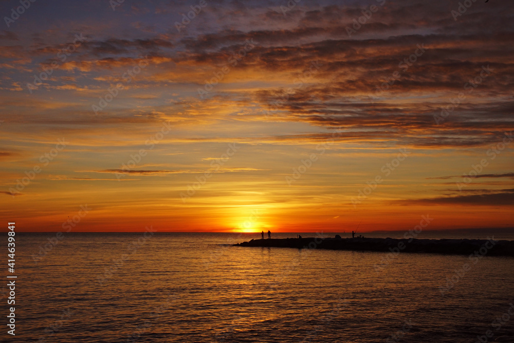 sunset over the sea in tuscant