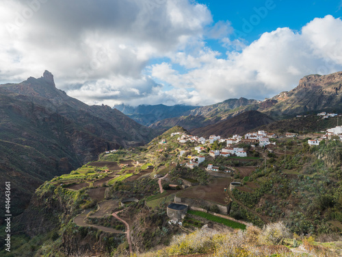 Picturesque Canarian village Tejeda in mountain valley scenery and view of Caldera de Tejeda and bentayga rock. Gran Canaria, Canary Islands, Spain photo