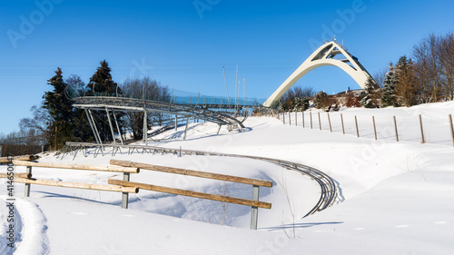 The St. George ski jump and Ski lift carousel (Skiliftkarussell) in winter near Winterberg in the Hochsauerland district of North Rhine-Westphalia photo