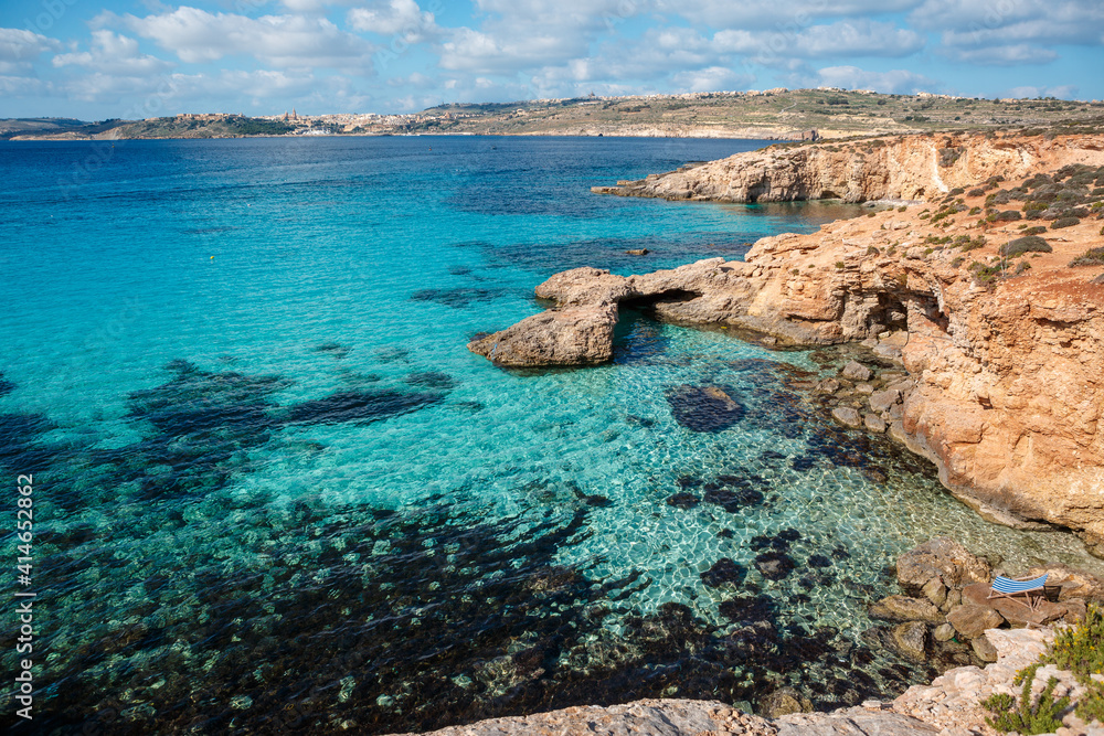 The Blue Lagoon in Comino Island. Idyllic turquoise beach in Malta.