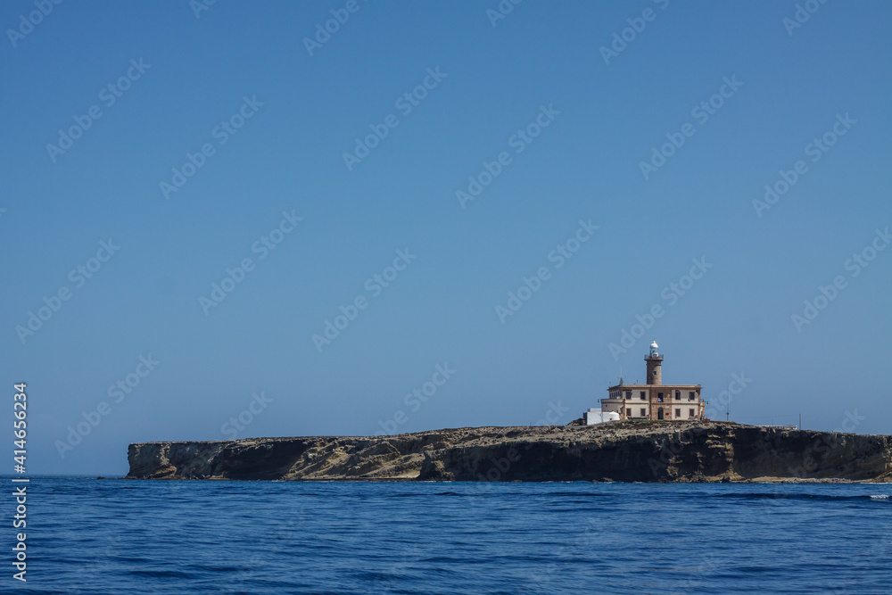View from the sea of the island of Alboran in the Mediterranean Sea between Europe and Africa