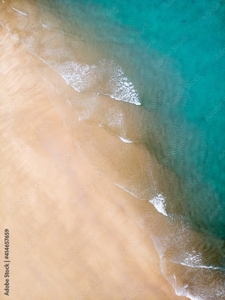 Idyllic sandy beach. Clean turquoise water. From Above. 