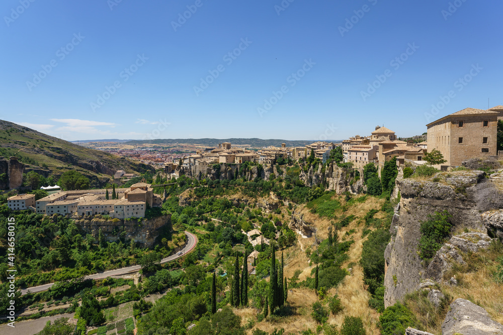 River Huecar, Cuenca, Castilla-La Mancha  from the top of this UNESCO World Heritage Spanish city in a sunny day. On the left side they are visible the Parador Nacional and the San Pablo bridge.