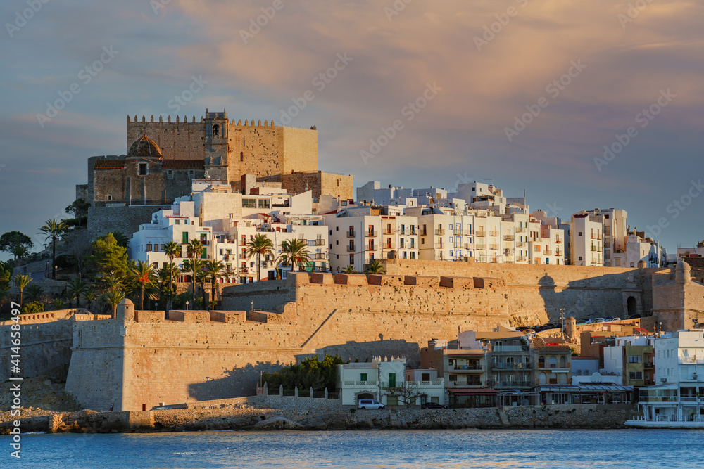 Close-up of the famous Templar and medieval city of Peñíscola with its castle walls over the sea.