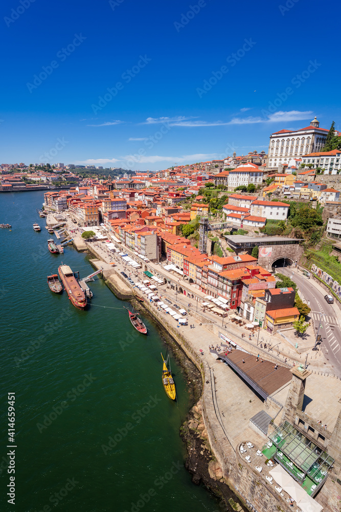 Porto, Portugal. Vertical Cityscape. Bairro da Ribeira, iconic quarter seen from high angle on sunlight.