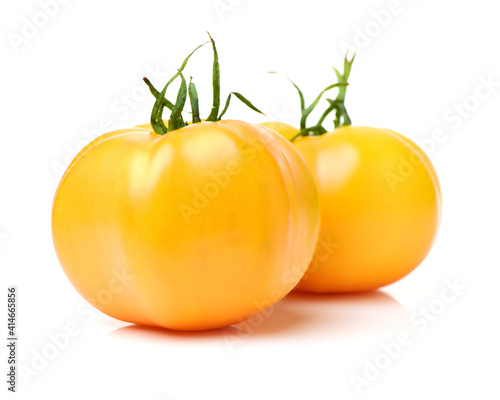 yellow tomato isolated on white background