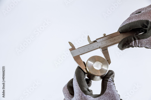 Принти на полотні Measuring inner diameter, outer diameter, length with a caliper on a white background