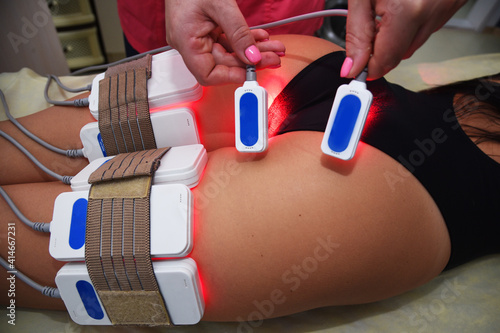 lipo laser. Hardware cosmetology. Body care. Non surgical body sculpting. body contouring treatment, anti-cellulite and anti-fat therapy in beauty salon. photo