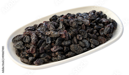 black raisins isolated on white background