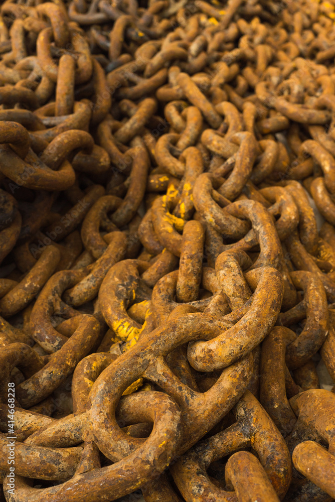 Large iron anchor chain. A rusty chain link. Corrosion. Shackles. Large iron anchor chain. A rusty chain link. Corrosion. Shackles.