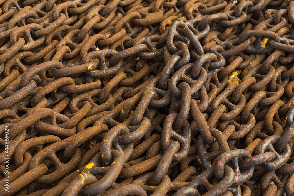 Large iron anchor chain. A rusty chain link. Corrosion. Shackles. Large iron anchor chain. A rusty chain link. Corrosion. Shackles.