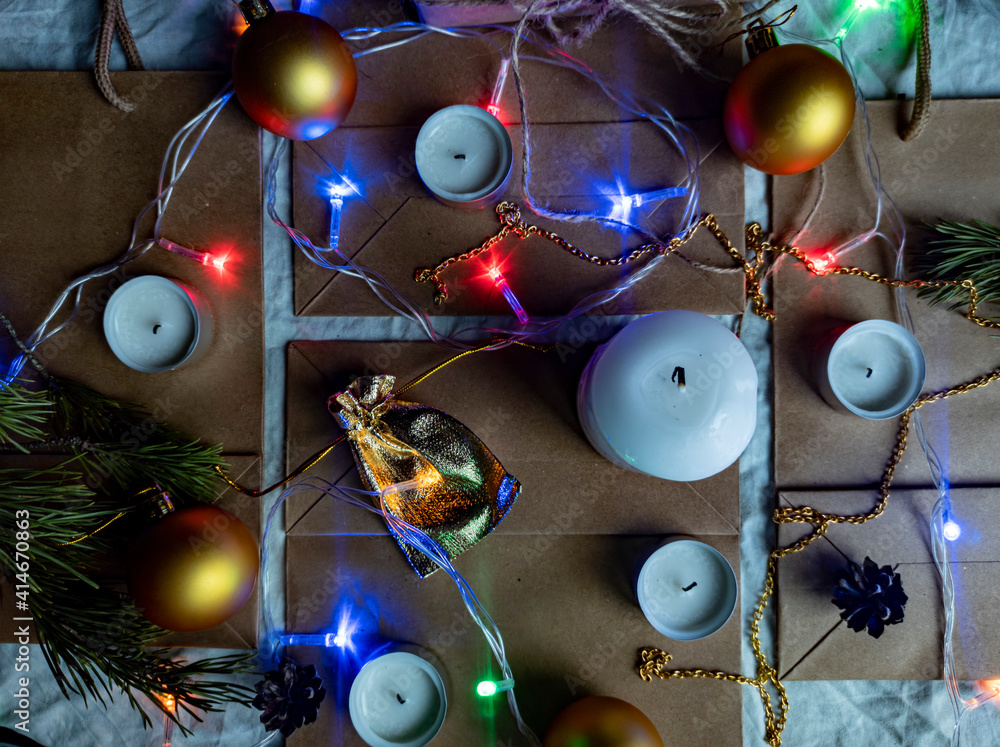 Photo New Year's flat ley. Christmas background. colorful decorations. new year multi-colored illumination. craft bags