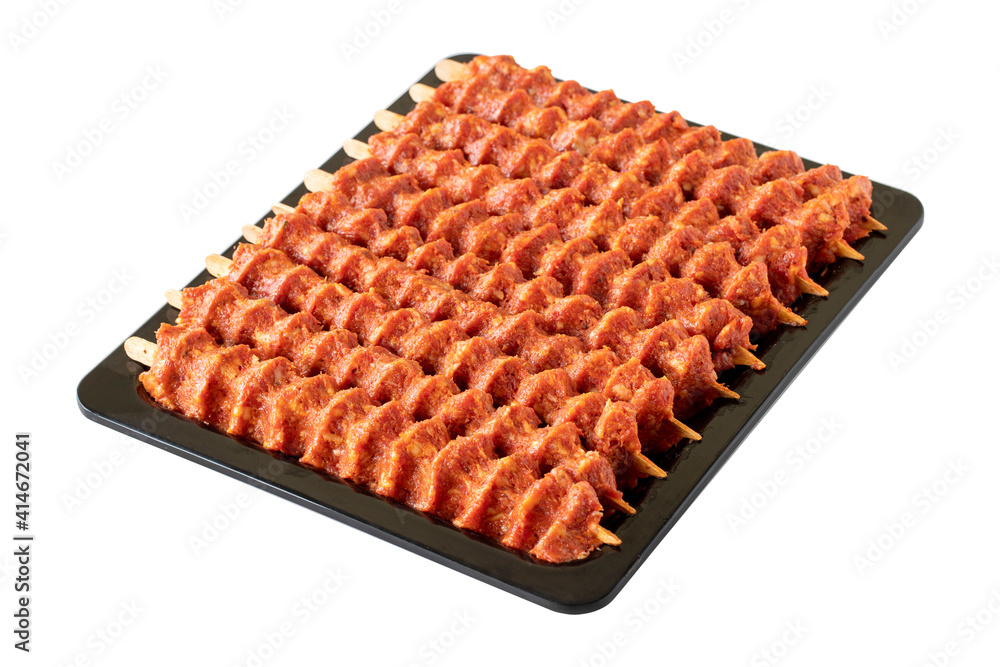 Raw spicy adana kebab isolated on white background Raw spicy adana kebab isolated on white background