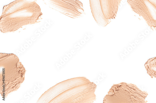 Frame from foundation smears, bb cream for makeup isolated on white background. Foundation face make-up samples, texture of face concealer. Make up smears, cosmetic, foundation colors palette Mock up