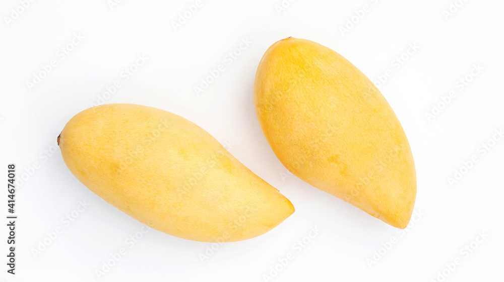 Ripe Barracuda mango on a white background. Ripe Barracuda mango on a white background.