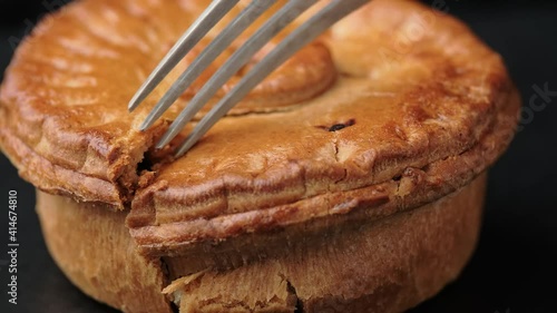 Take a bite of tasty British beef steak pie with wine gravy.