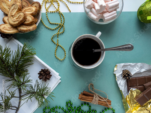Obraz na płótnie new year's flat lay. green background. top view photo. Christmas decorations, coffee. New year, Christmas, Valentine's day. w salonie