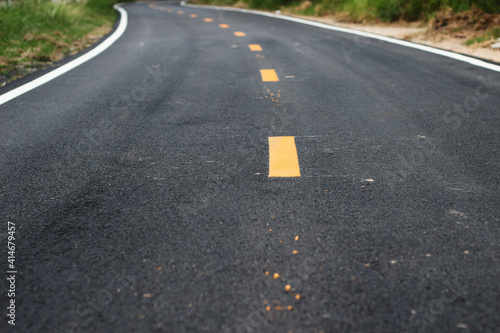Wallpaper Mural black asphalt winding road transport with white and yellow line Torontodigital.ca