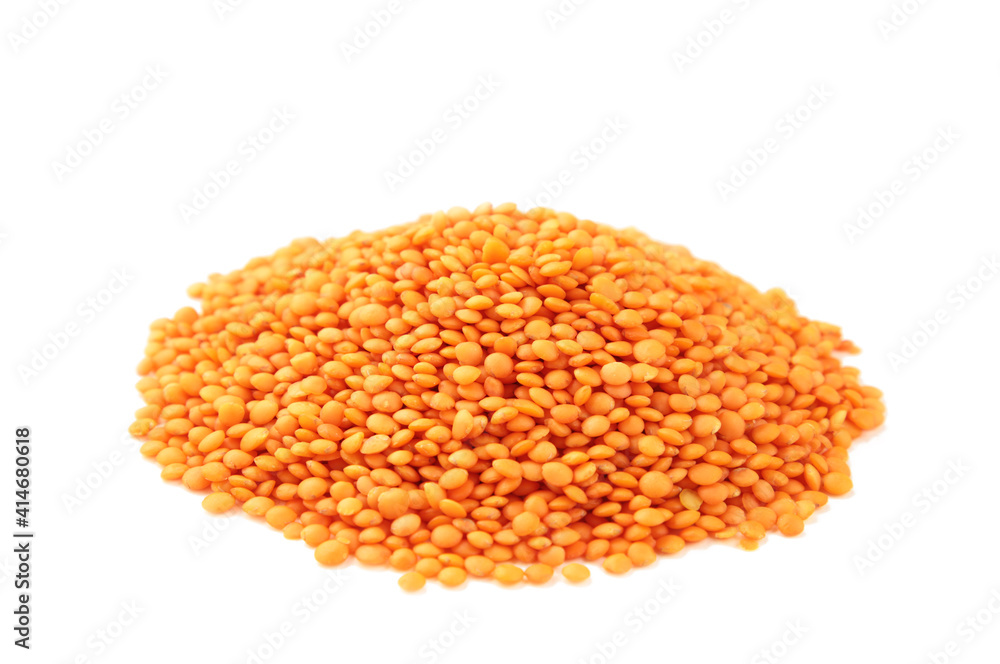 Red lentils isolated on a white background. Red lentils isolated on a white background.