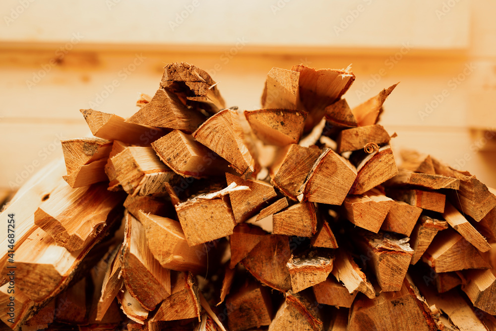 chopped natural wood firewood lying in a pile chopped natural wood firewood lying in a pile