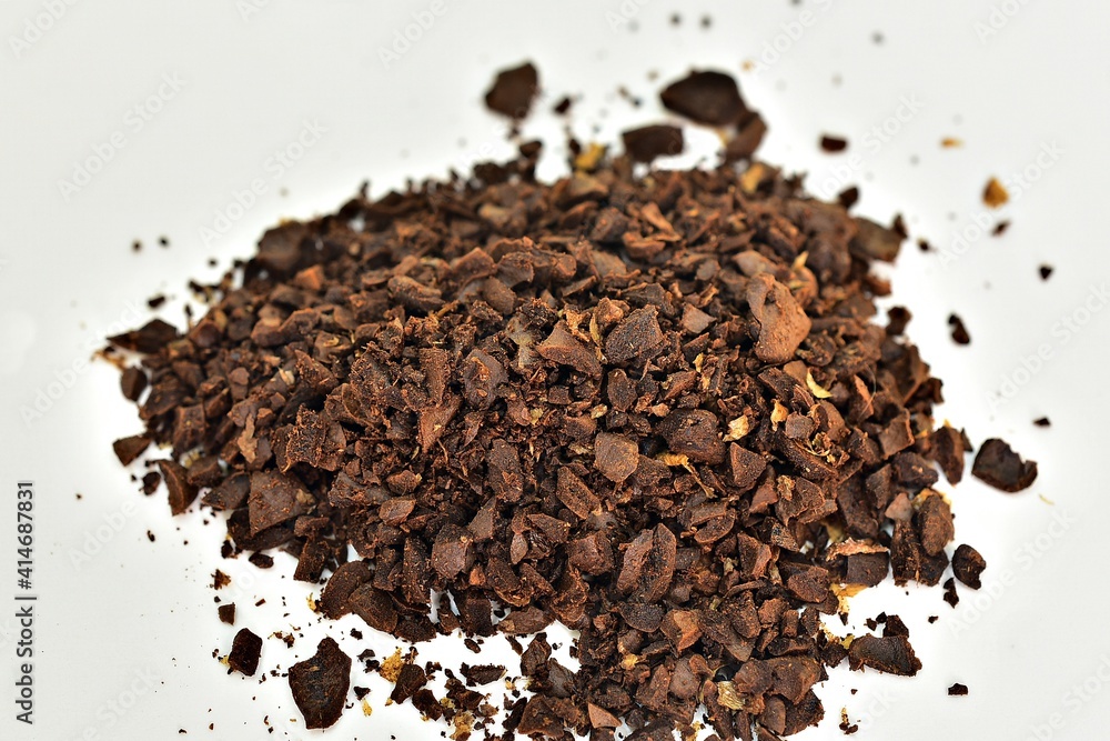 roasted coffee beans cut in haft on background white roasted coffee beans cut in haft on background white