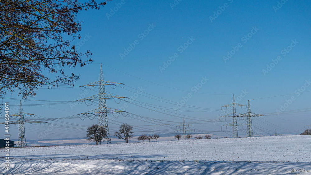 power pole in winter landscape