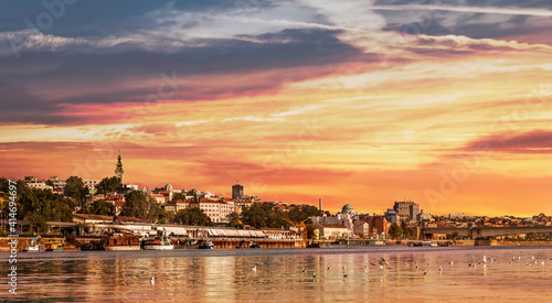 Belgrade Sunset Panorama with Tourist Nautical Port and Downtown Skyline, Viewed from Sava River Perspective. © buki77