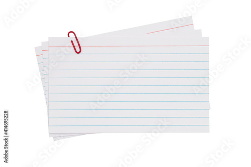 Retro white paper index cards with paper clip isolated on white photo