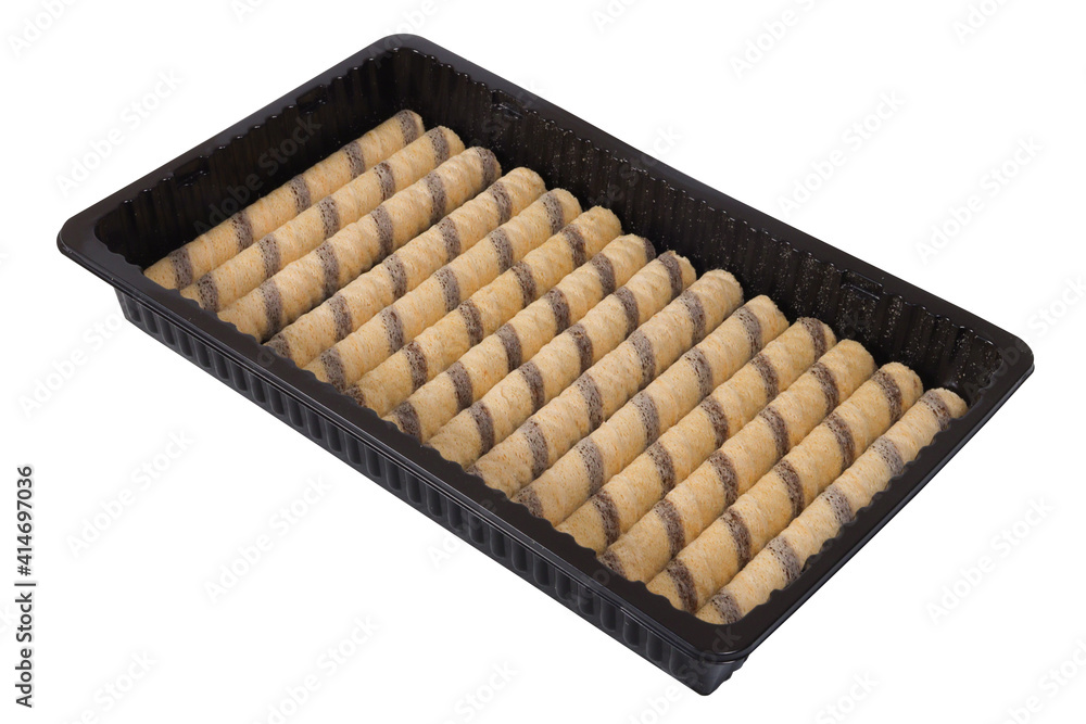 Waffle sticks in a package on an isolated white background. Wafer stick packaging Waffle sticks in a package on an isolated white background. Wafer stick packaging