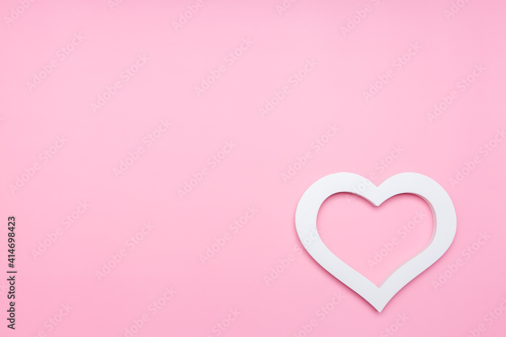 white heart on a pink background with room for text