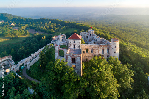 Ruins of medieval Tenczyn castle in Rudno near Krakow in Poland. Aerial view in sunrise light in summer © kilhan