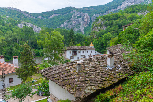 Cherepish monastery situated on a shore of Iskar river in Bulgaria photo