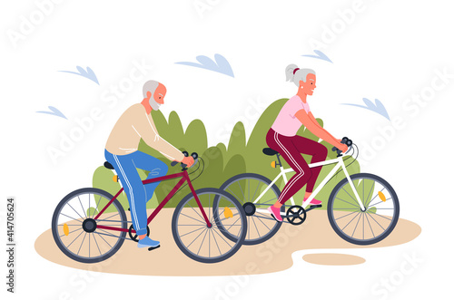 Senior elderly couple enjoying cycling in summer outdoor park, healthy lifestyle