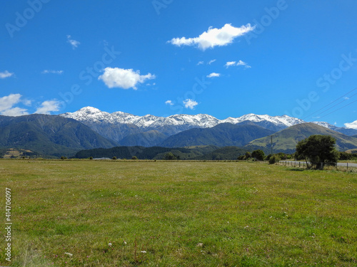 Green field and mountains New Zealand 
