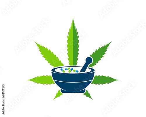 Green cannabis leaf with mortar and pestle