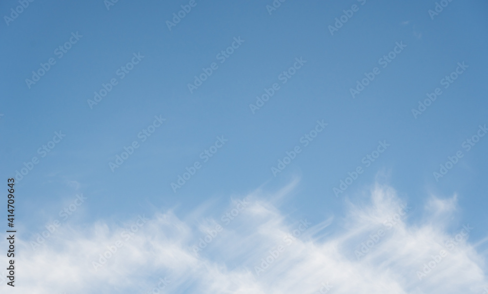 Panoramic fluffy cloud in the blue sky with copyspace Panoramic fluffy cloud in the blue sky with copyspace