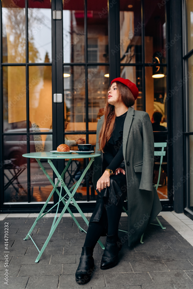 Girl drinking coffee in the cafe. Girl drinking coffee in the cafe.