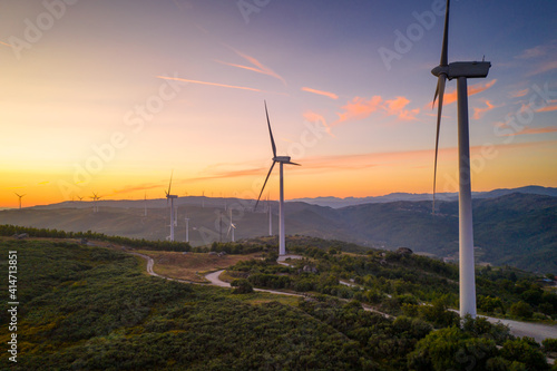 Drone aerial view of wind turbines eolic renewable energy in Fafe landscape, Portugal photo