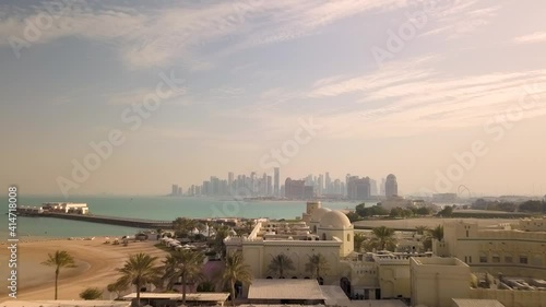 Aerial view of Doha cityscape during sunset, Qatar