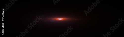 Beautiful digital light flare. Abstract Glowing light effect lens flare on dark background