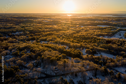 Arial view of forest in Maine at sunrise