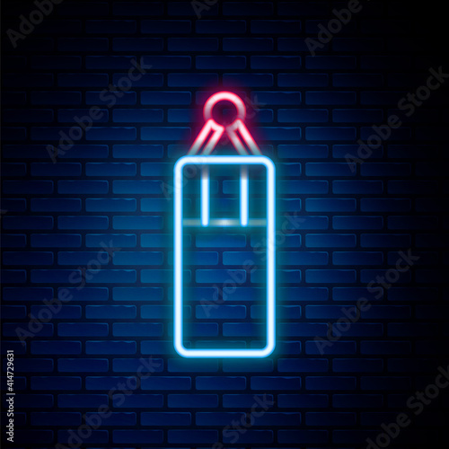 Glowing neon line Punching bag icon isolated on brick wall background. Colorful outline concept. Vector.