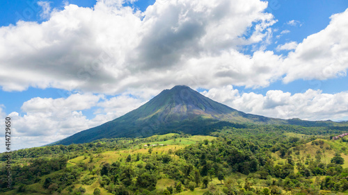 Amazing view of beautiful nature of Costa Rica with smoking volcano Arenal background. Panorama of volcano Arenal  La Fortuna  Costa Rica. Central America.