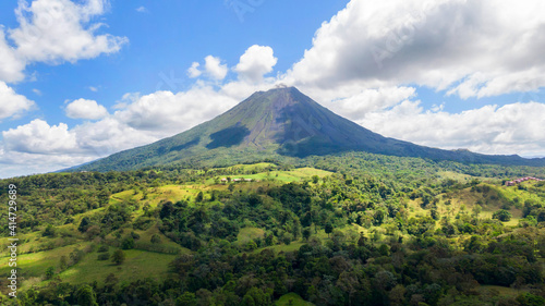 Amazing view of beautiful nature of Costa Rica with smoking volcano Arenal background. Panorama of volcano Arenal, La Fortuna, Costa Rica. Central America.