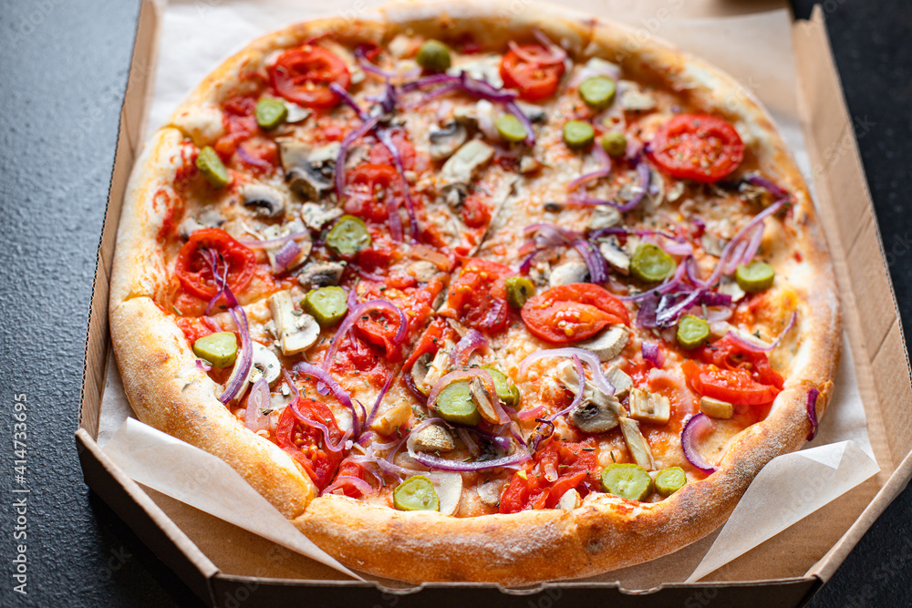 pizza vegetable tomato, pickles, mushrooms vegan or vegetarian no meat on the table healthy snack top view copy space food background rustic 