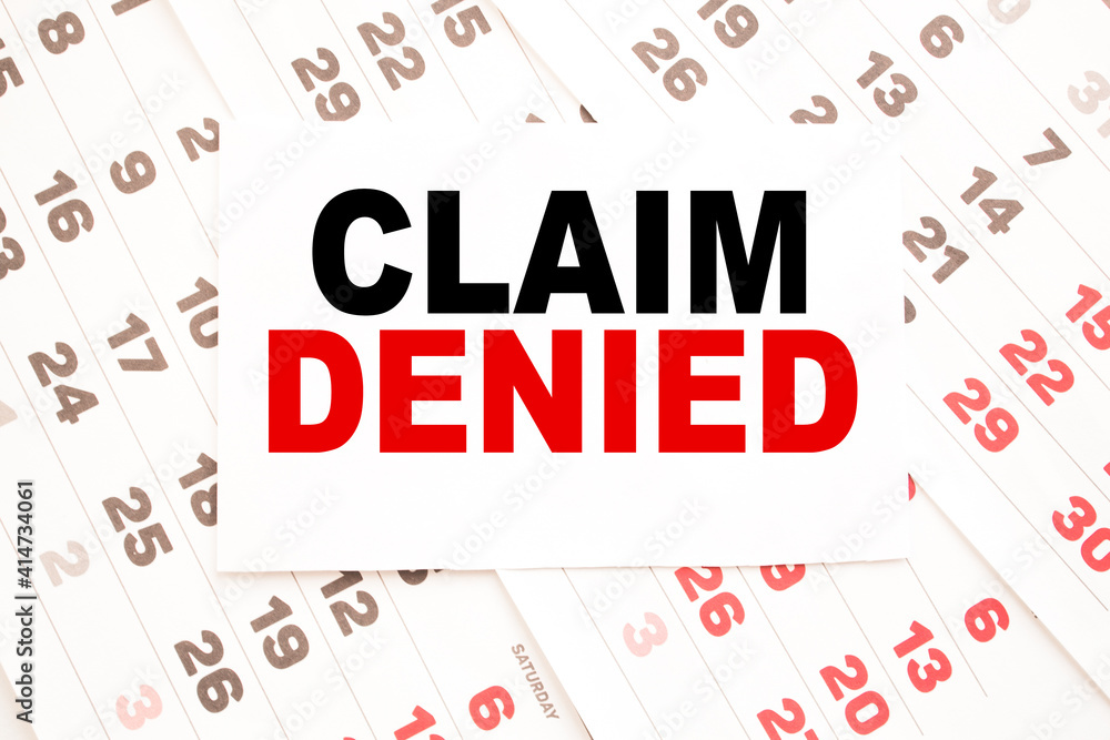 text CLAIM DENIED on a sheet from Notepad.a digital background. business concept . business and Finance. text CLAIM DENIED on a sheet from Notepad.a digital background. business concept . business and Finance.