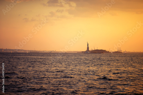 beautiful city skyline at sunset. USA. Statue of Liberty National Monument