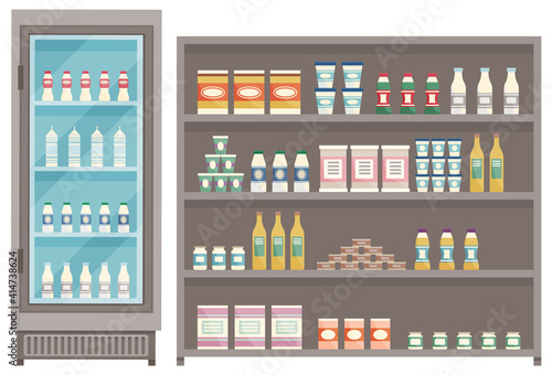 Showcase with groceries in the store. Fridge for cooling dairy products. Different colored bottles and boxes on shelves. Refrigerator dispenser cooling machine, shop equipment, goods in supermarket